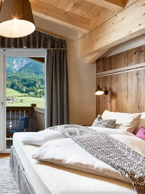 Bett im Penthouse Pinzgauer