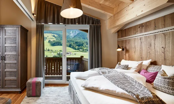 Bett im Penthouse Pinzgauer
