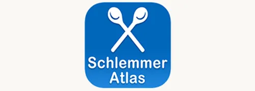 Logo von Schlemmer Atlas mit zwei gekreuzten Löffeln auf blauem Hintergrund