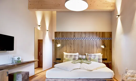 Bed in the Penthouse room Die Pinzgauerin