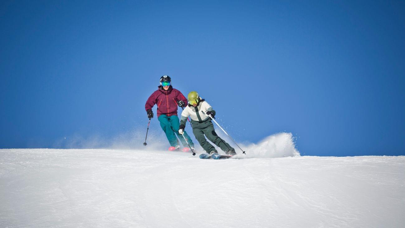 Skiers in Saalbach in the region of Salzburg