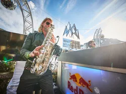 Live saxophone performance at White Pearl Mountain Days outdoor music event