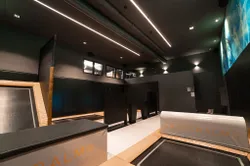 Indoor trampoline park with padded walls and soft flooring at Riederalm